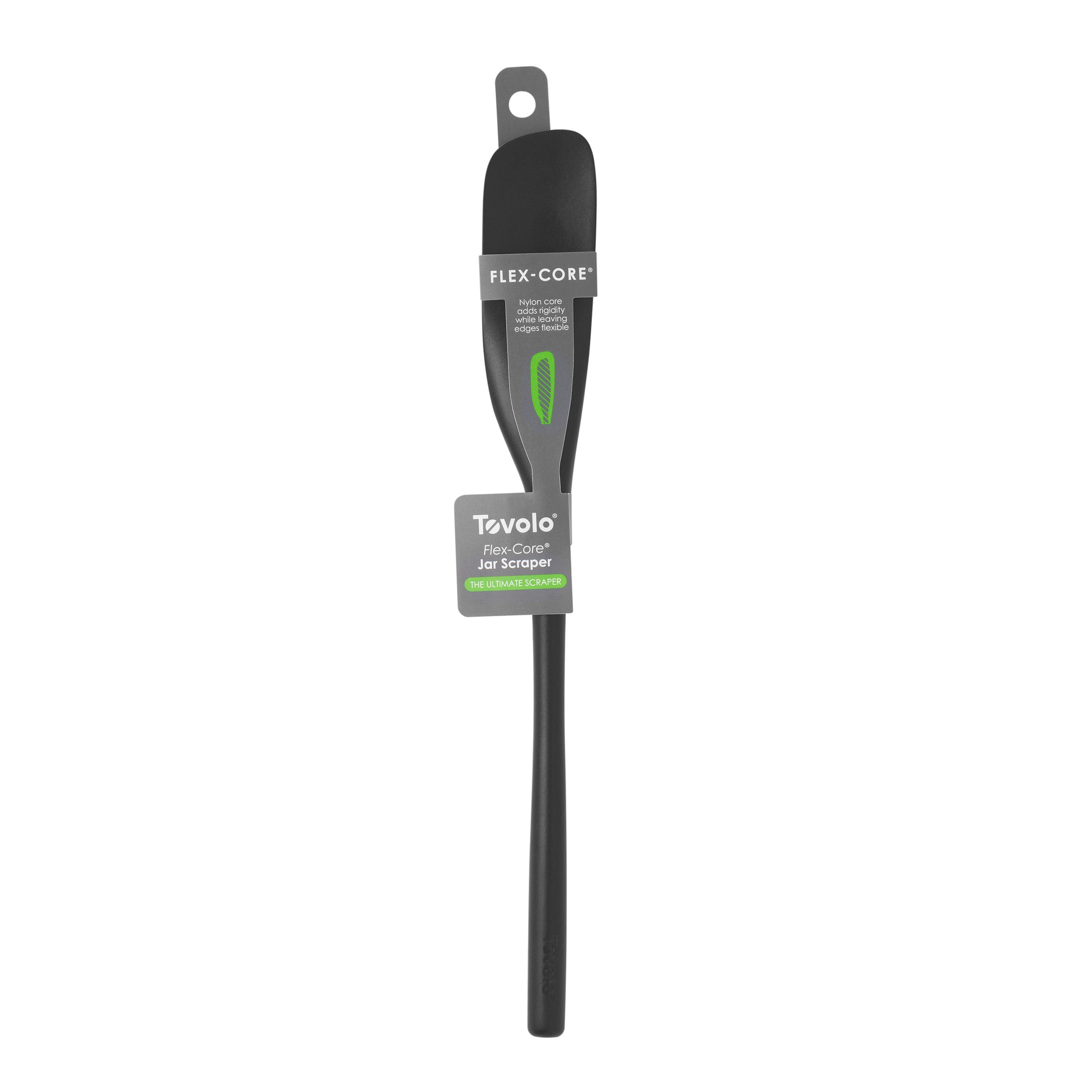The Flex-Core Jar Scraper—black silicone with a long handle, green accent, and attached tags—is shown on a white background, making it an essential kitchen tool for any home chef.