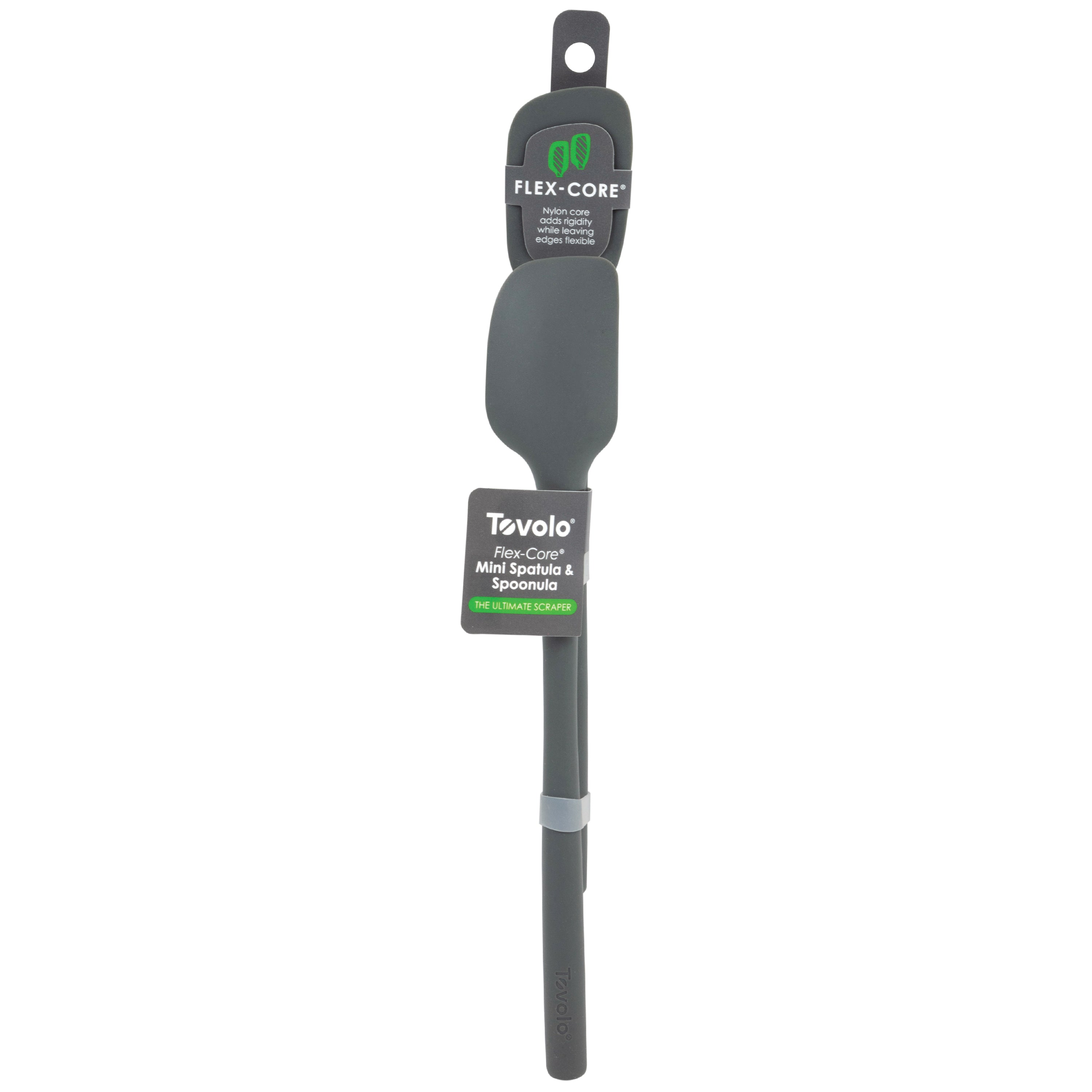 A Flex-Core Mini Spat + Spoonula in gray, shown with its packaging, emphasizes its flexible, heat-resistant silicone design and features branding labels on the handle and center.