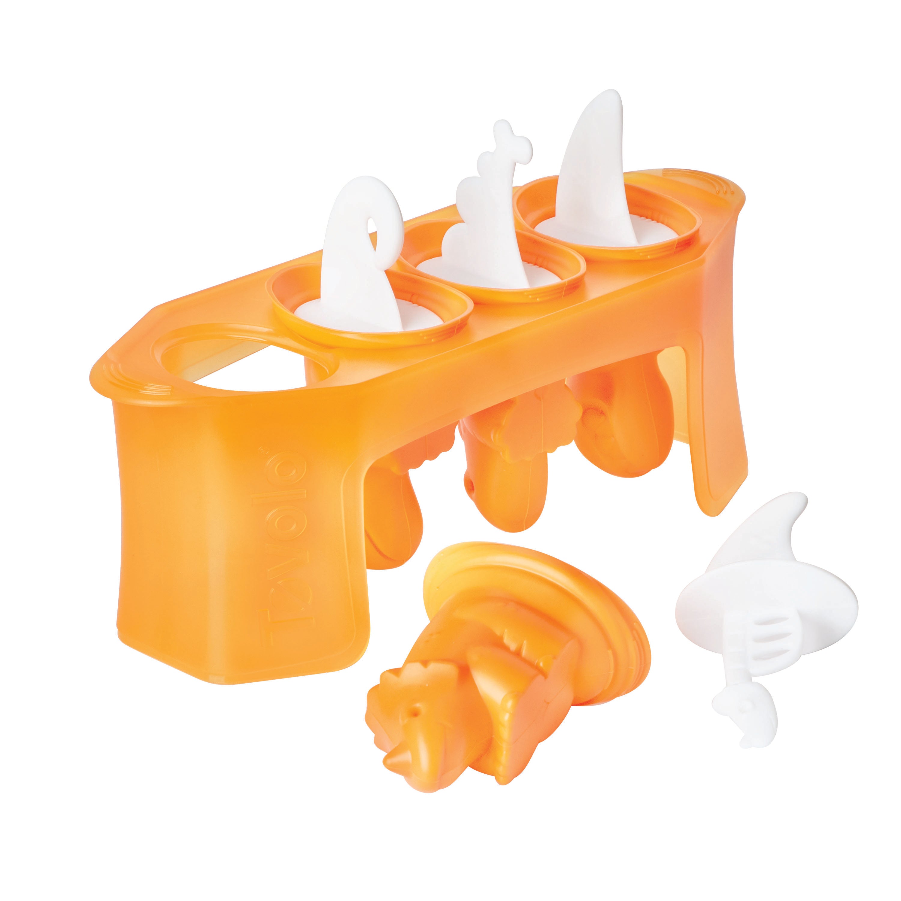 The Pop Molds set features an orange slimline tray with three molds: a shark fin, a tail, and a dinosaur head, all with white handles. One dinosaur-shaped mold is removed and shown in front—great for homemade frozen treats.