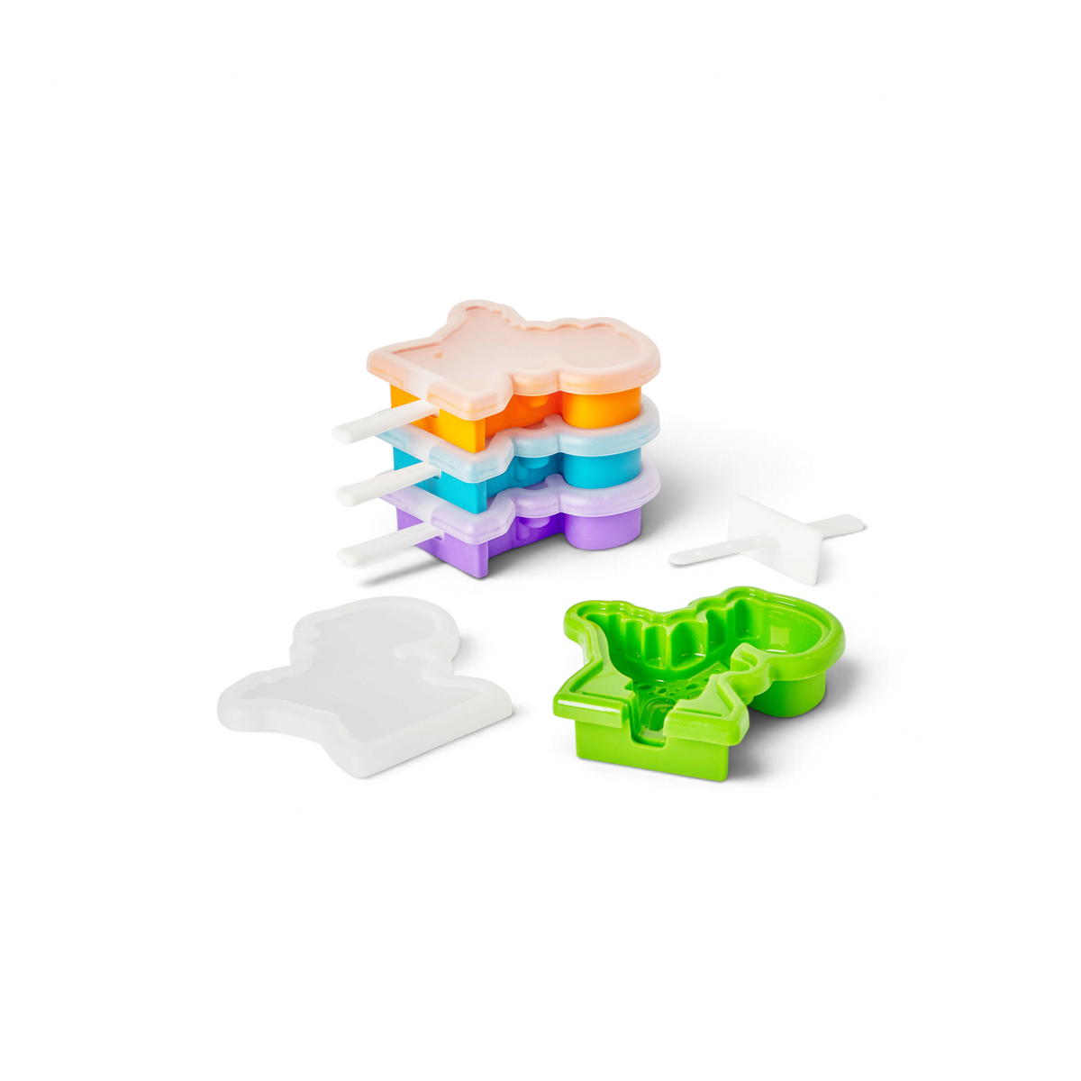 Stackable Pop Molds: four colorful, dinosaur-shaped silicone popsicle molds with white sticks, green mold, white lid, and spatula on a white background—fun and perfect for homemade frozen treats.