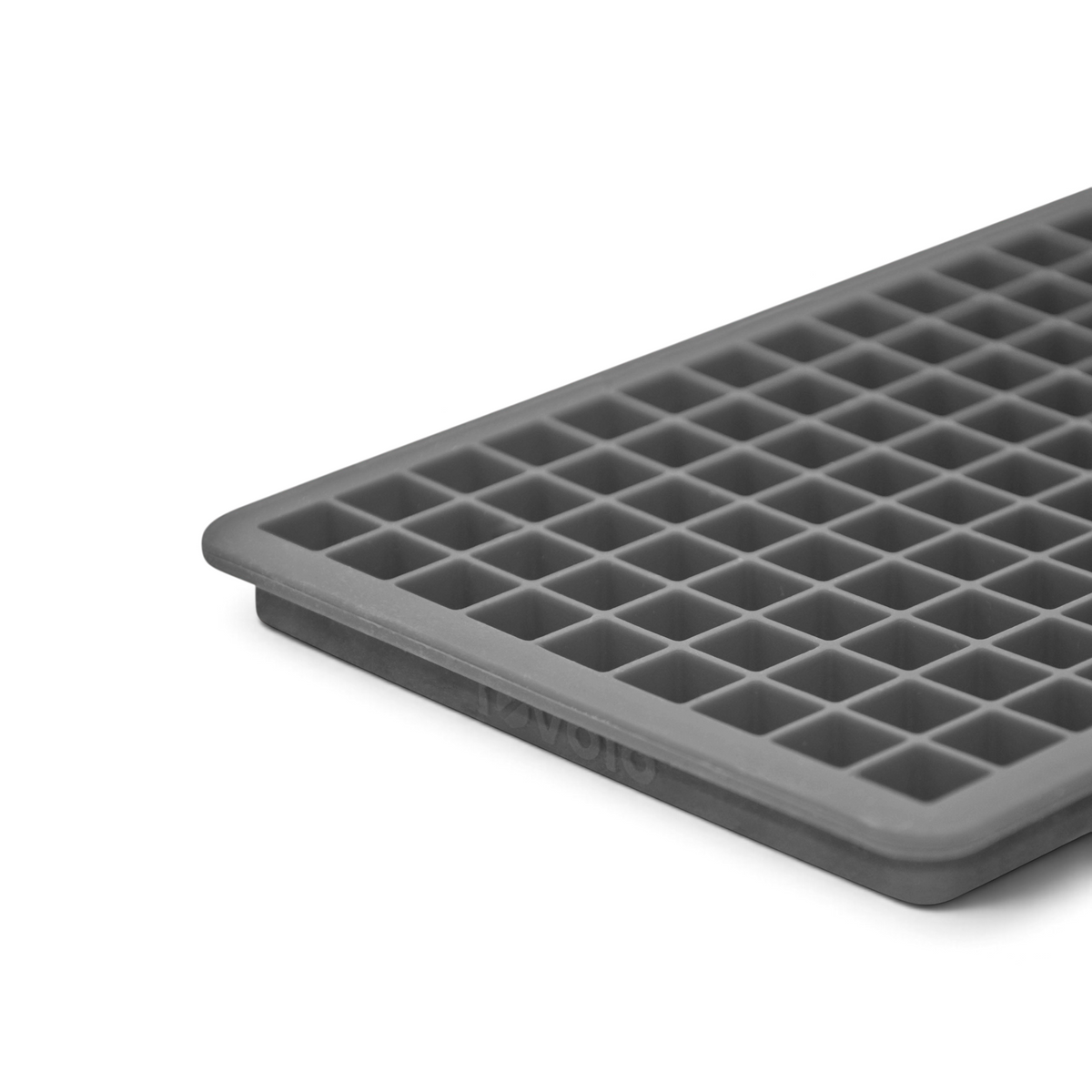 A close-up of the Mini Ice Mold, a gray silicone tray with small square compartments shown from an angle—perfect for making mini ice cubes to quickly chill your drinks.