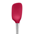 The tovolo Flex-Core Silicone and Stainless Steel Spoonula in red features a sleek stainless steel handle, displayed against a white background.