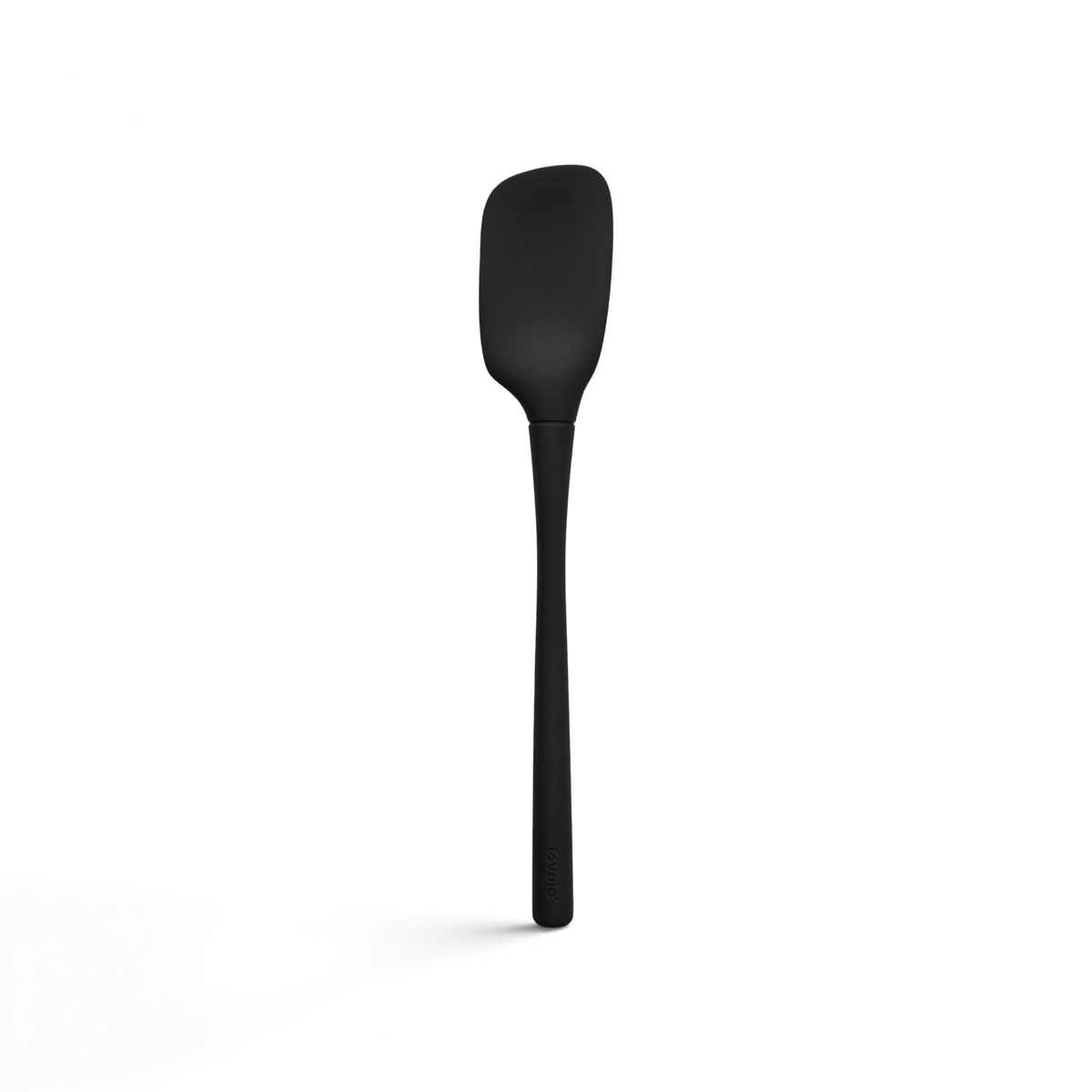 The tovolo Flex-Core Silicone Spoonula features a long handle and flat, rectangular blade, making it ideal for mixing or scraping food in bowls and pans.
