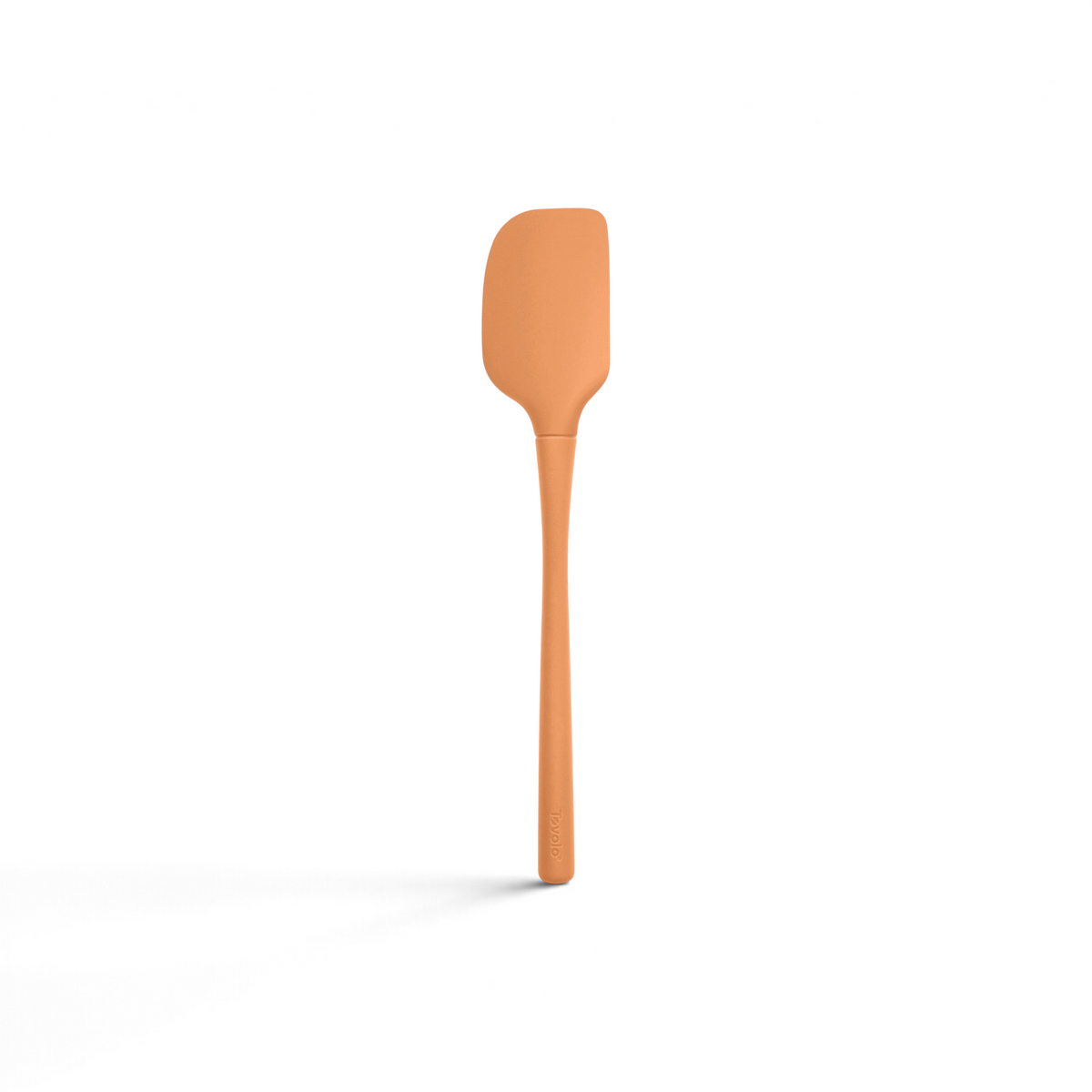 A tovolo Flex-Core Silicone Spatula with a long handle and a flexible, rectangular orange blade is displayed against a white background.