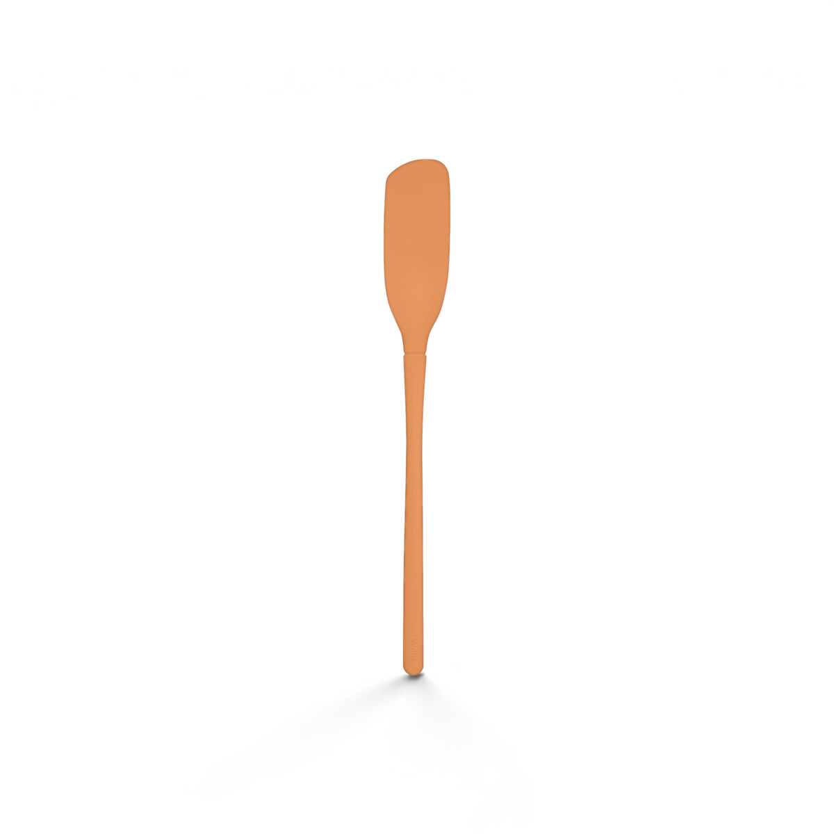 The Flex-Core Blender Spatula is a long-handled silicone spatula with a narrow, flexible blade and straight handle, perfect for mixing or scraping food from containers.