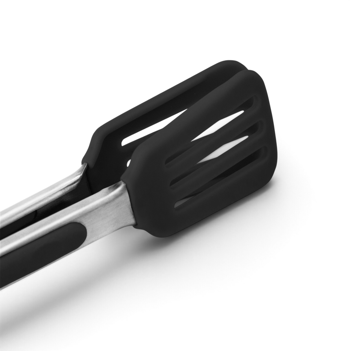 Close-up of the black silicone grips on Mini Turner Tongs, featuring slotted tips and sleek metal arms, set against a white background.