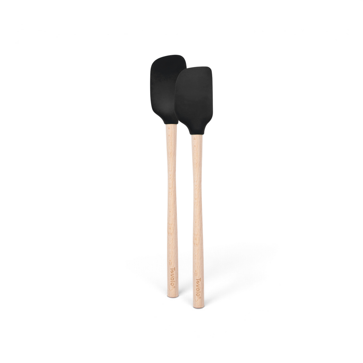 The tovolo Flex-Core Silicone Mini Spatula + Spoonula set features two black, heat-resistant utensils with light wooden handles, displayed side by side on a white background as versatile kitchen tools.