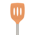 The Silicone Slotted Turner features a nonstick-safe orange silicone slotted spatula head and a stainless steel handle, displayed against a white background.