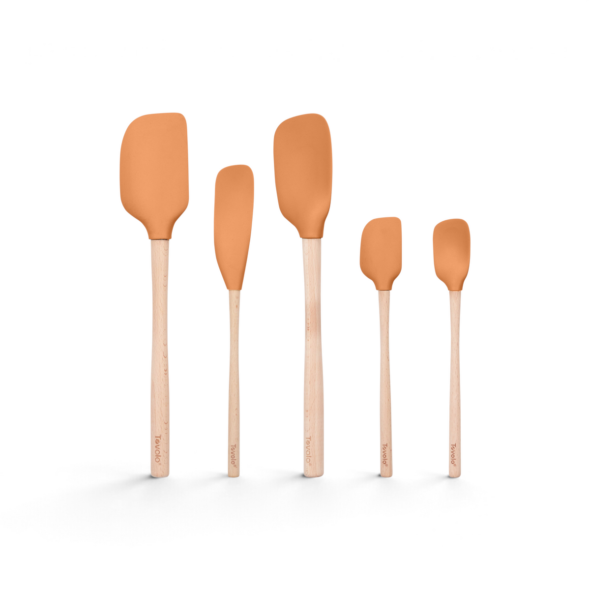 The Flex-Core Wood-Handle Spatula Set of 5 includes classic spatulas and a jar scraper with orange silicone heads and light wood handles, arranged in various sizes and shapes.