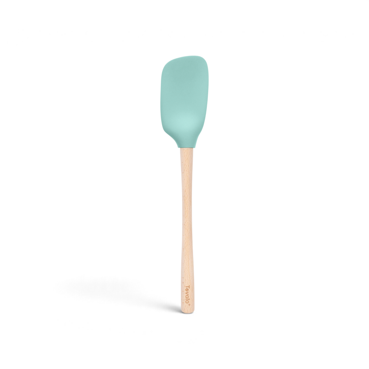 The tovolo Flex-Core Silicone Spoonula features a light blue silicone head and a light wooden handle, shown against a white background.