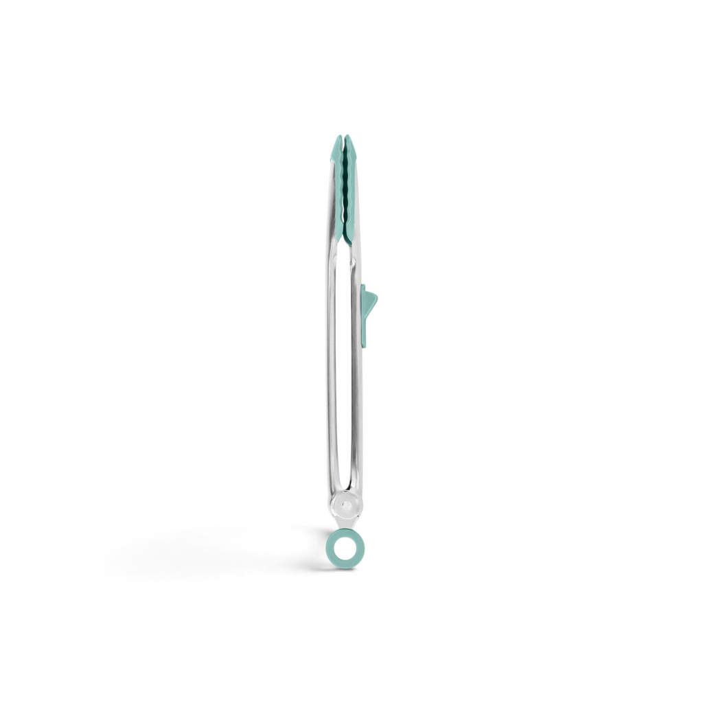 The Tip Top Tongs, silver metal silicone tongs with teal tips and a matching hanging loop, feature a locking stainless steel handle and are displayed vertically against a white background.
