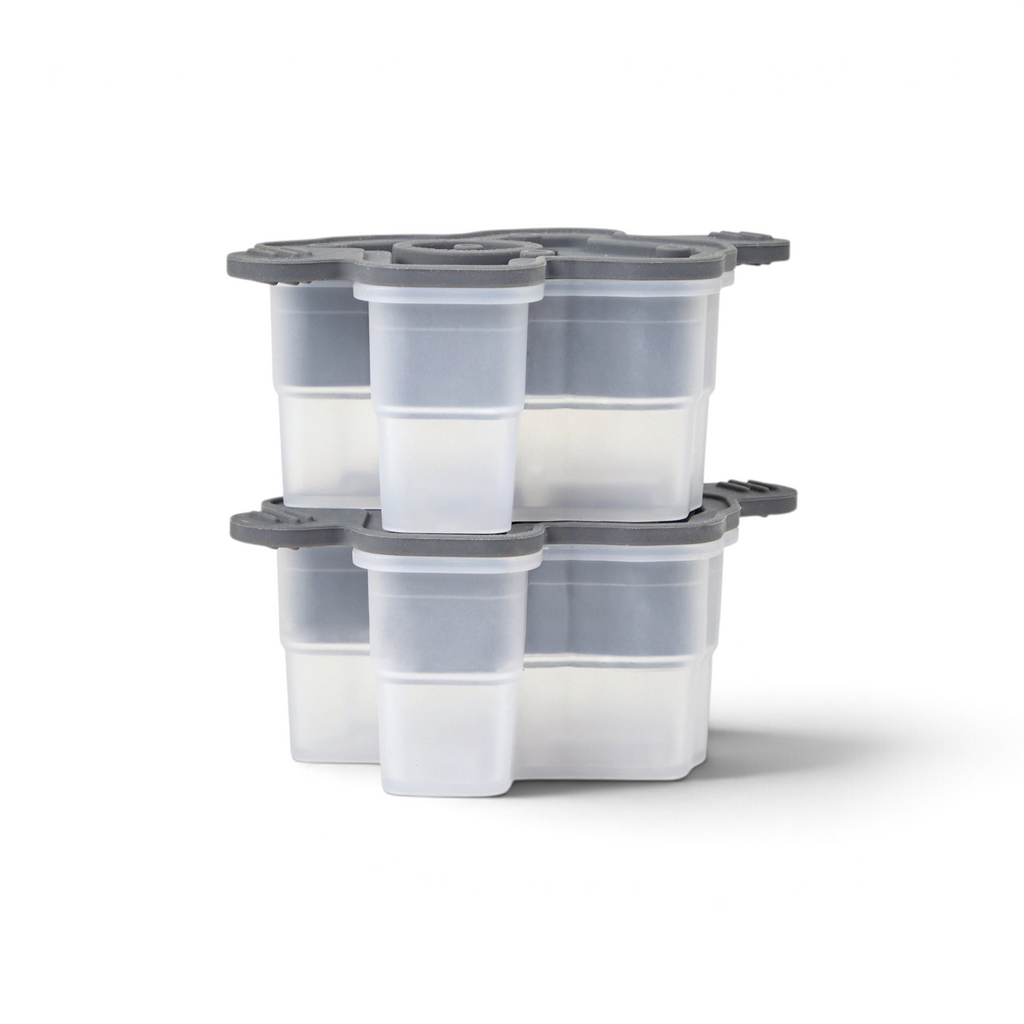 The tovolo Texas Ice Molds (Set of 2) features clear plastic storage with dark gray lids, each set offering four compartments—ideal for organizing silicone or craft ice molds, shown isolated on a white background.
