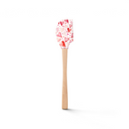 The Spring Spatulart is a wood-handled spatula with a silicone head featuring red and pink watercolor hearts on white, blending style and function for your kitchen.
