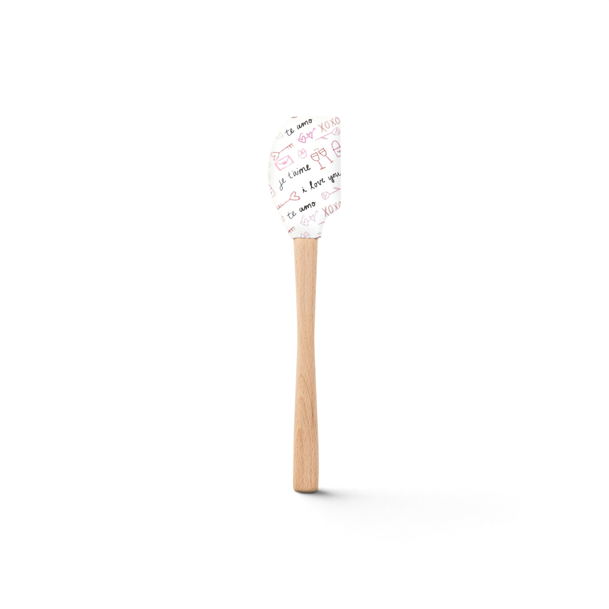 The Spring Spatulart features a wood handle and a silicone head decorated with pink and black romantic doodles and sweet phrases like "ti amo," "XOXO," and "I love you"—perfect for adding love to your kitchen creations.