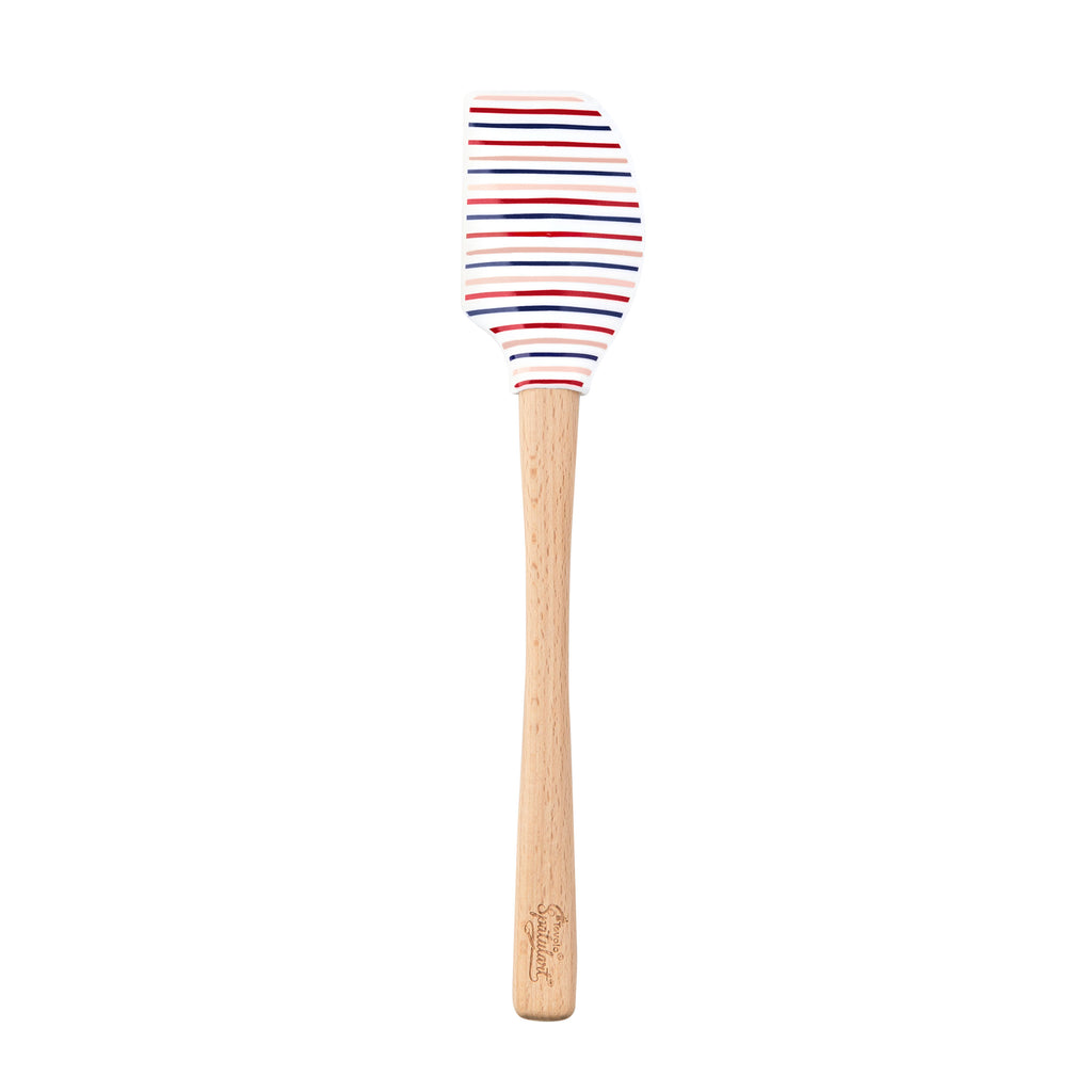 The Summer Spatulart features a durable white silicone head with red, blue, and black stripes and a wood handle engraved at the base. Set on a plain white background, this kitchen utensil blends style and function.