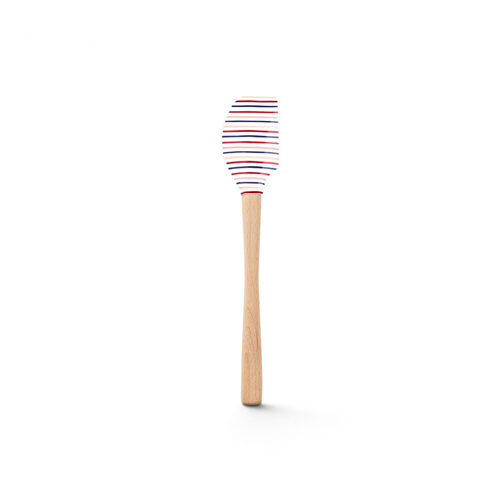 The Summer Spatulart is a durable kitchen utensil with a wooden handle and a white silicone head featuring red, blue, and navy horizontal stripes.