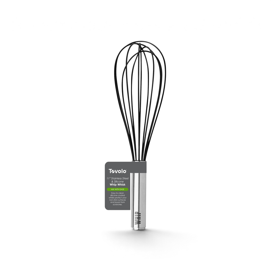The Whip Whisk features a black balloon design with a stainless steel handle and a gray Tovolo label displaying product info. Photographed against a white background, this kitchen essential combines style and function.