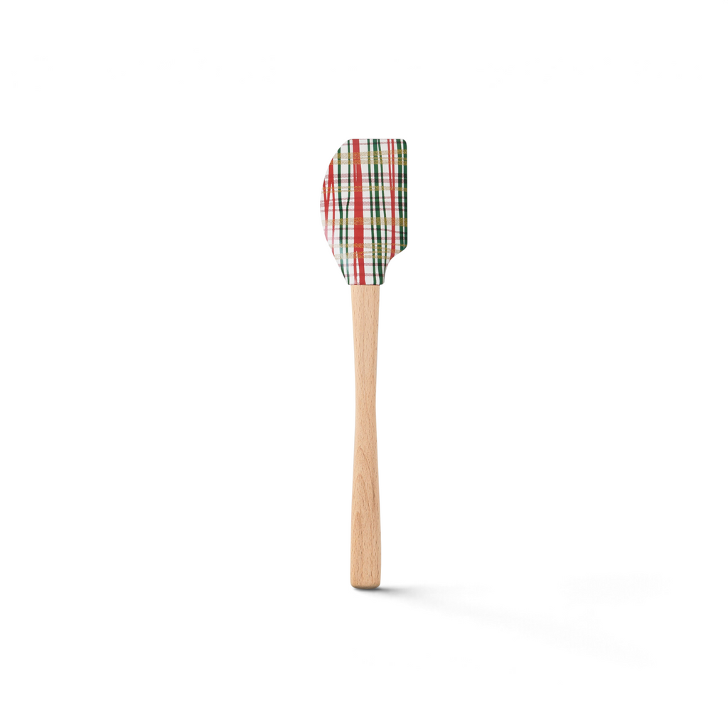 The Holiday Spatulart features a colorful plaid silicone head and a light wooden handle, shown on a white background.