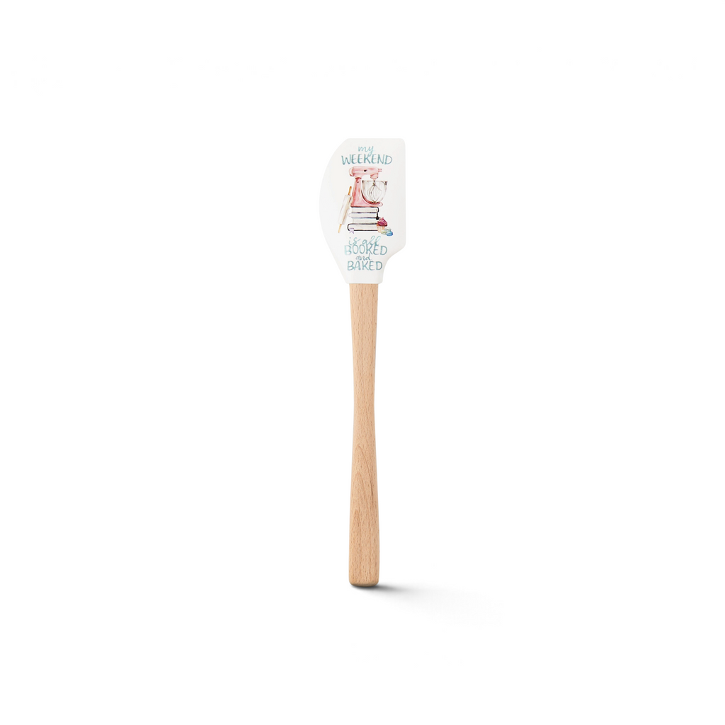 The Kitchen Hacks Spatulart features a wood handle and silicone head with a cat lying on books and the phrase "my weekend is all booked & baked." A charming baking conversion spatula, it's perfect for book and baking lovers.