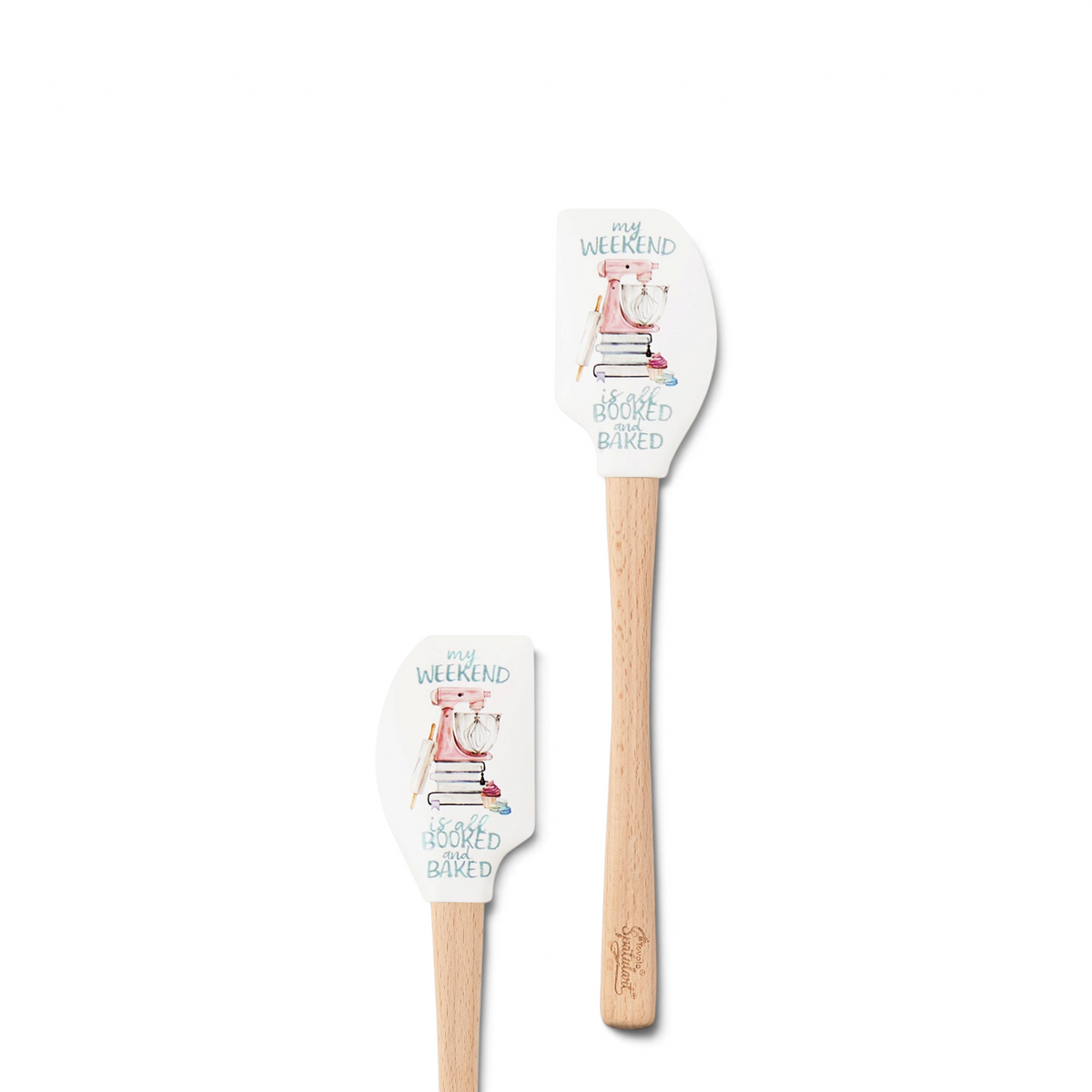 The Kitchen Hacks Spatulart set includes two wood-handled silicone spatulas adorned with books, a cup, glasses, and "MY WEEKEND IS BOOKED & BAKED"—ideal for book lovers and perfect for handy baking conversions.