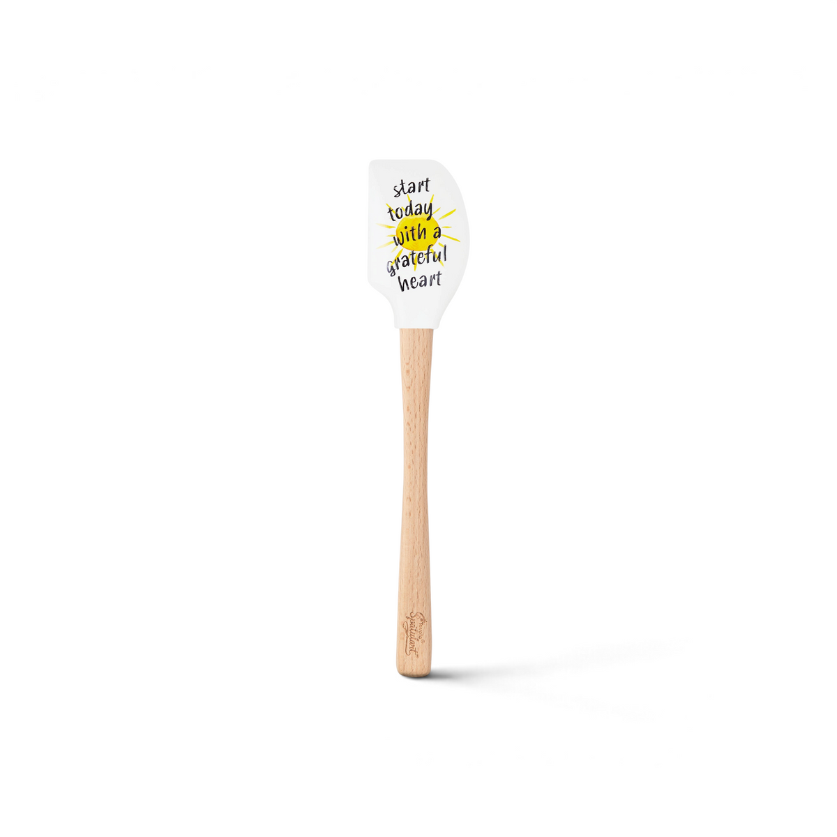 The Autumn Spatulart is a white silicone spatula with a wooden handle, displaying "Start today with a grateful heart" in black and yellow, highlighted by cheerful yellow rays around "with.
