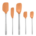 The Flex-Core All-Silicone Spatula Set of 5 features orange spatula heads and stainless steel handles, arranged upright from largest to smallest. Includes a Classic Spatula and Jar Scraper, each handle marked with the Tovolo brand.
