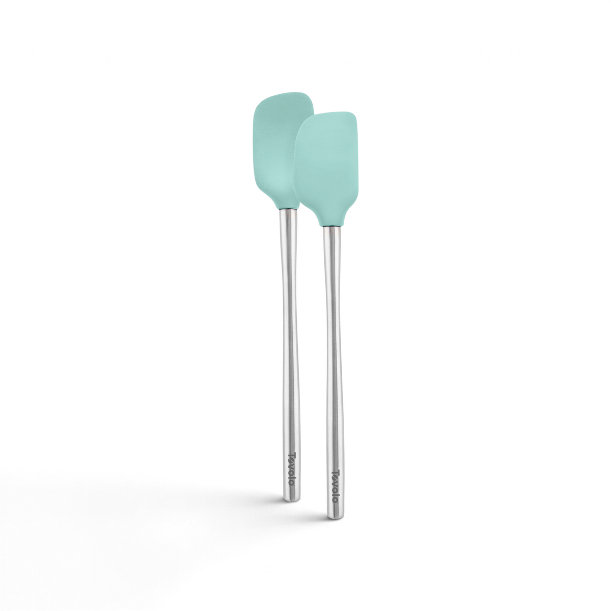 Two light blue tovolo Flex-Core Mini Spatula and Spoonula with stainless steel handles stand upright side by side on a white background.