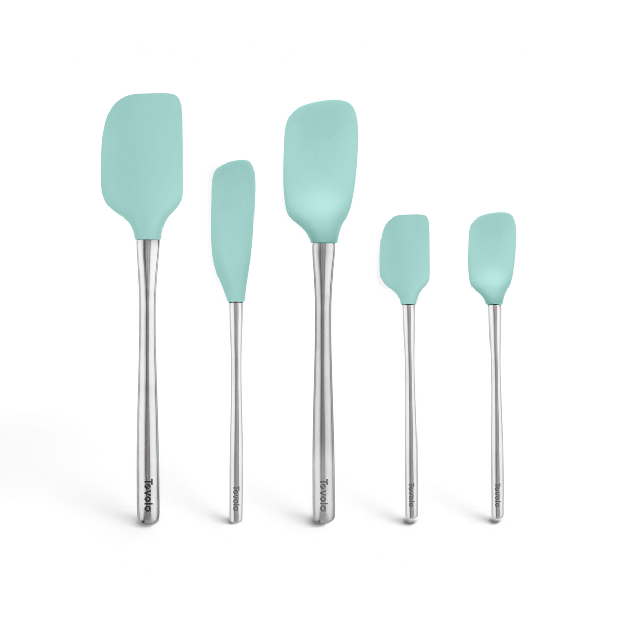 Five mint-green Flex-Core All-Silicone Spatula Set of 5 pieces, each with a uniquely shaped head like a Classic Spatula and Jar Scraper, stand upright in a row against a white background.
