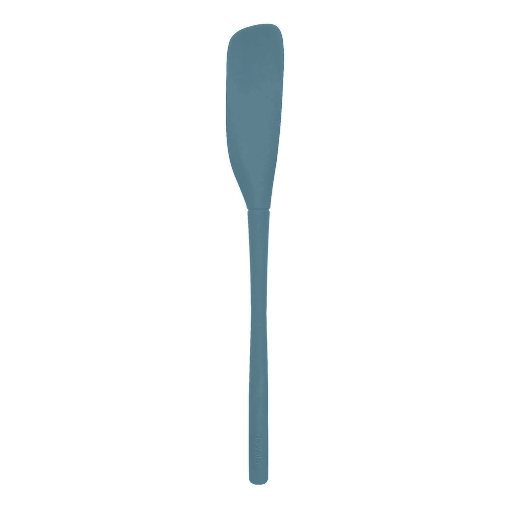The tovolo Flex-Core Silicone Jar Scraper is a long, slender blue spatula with a rounded, curved blade and narrow handle—ideal for kitchen tasks or scraping jars, shown isolated on white.