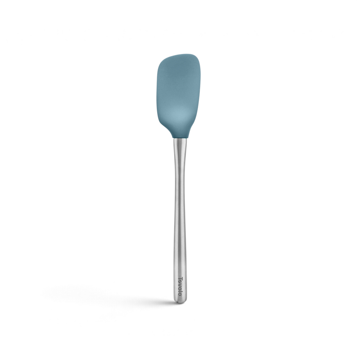 The tovolo Flex-Core Silicone Spoonula features a blue flexible silicone head and a long stainless steel handle—an essential kitchen tool for mixing and scraping, shown against a white background.