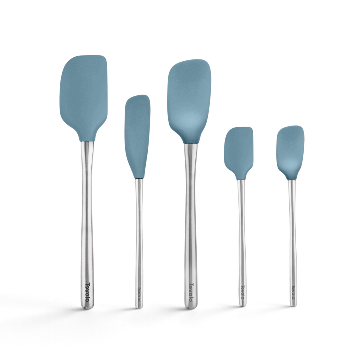 The Flex-Core All-Silicone Spatula Set of 5 features blue silicone spatulas in various shapes and sizes, each with stainless steel handles, arranged upright in a row against a white background.