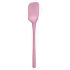 The tovolo Flex-Core Silicone Spoonula features a curved, rectangular head and a long handle in pink, displayed against a white background.