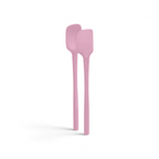 The tovolo Flex-Core Silicone Mini Spatula + Spoonula, both pink and heat-resistant, stand upright side by side against a white background.