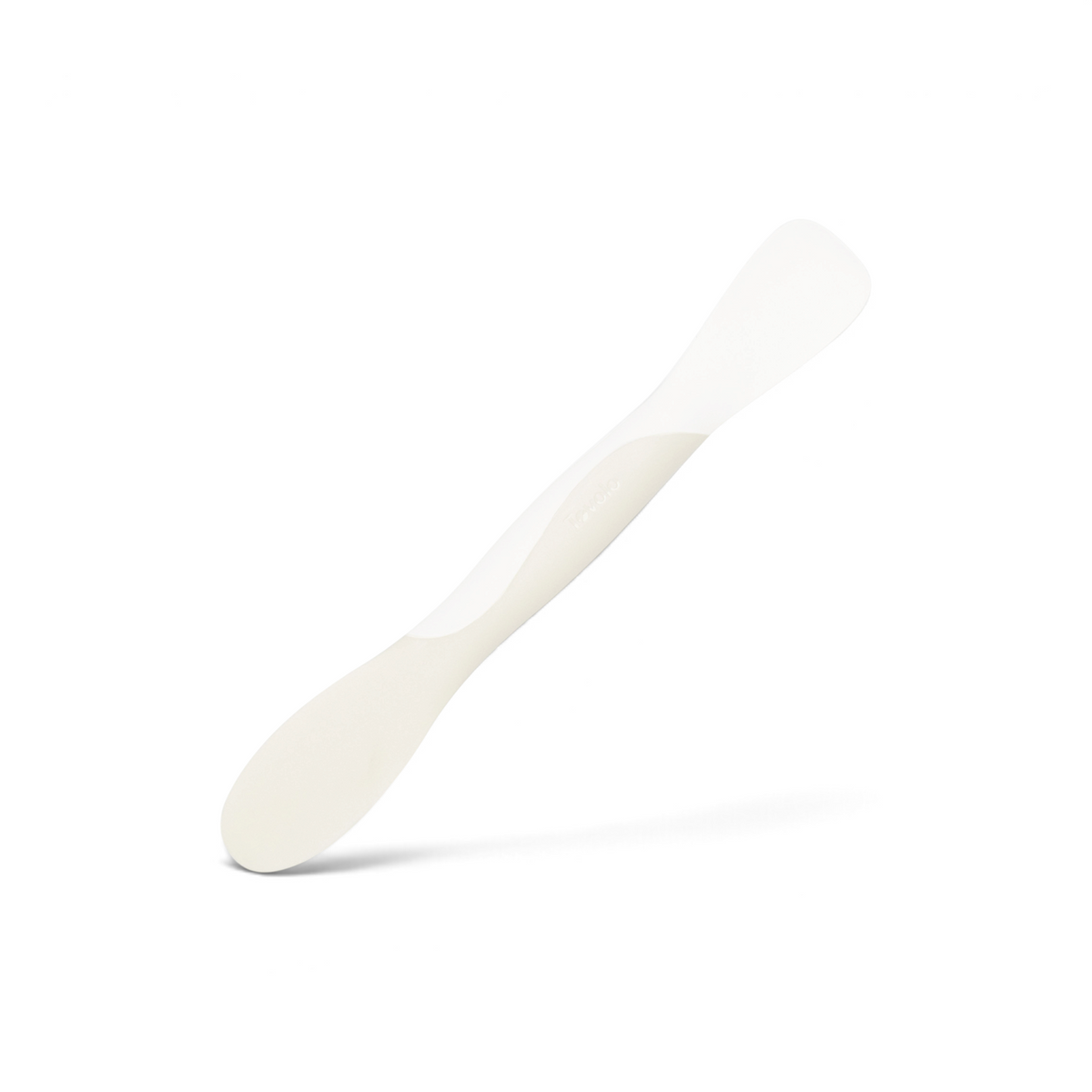 The Scoop and Spread, a white double-ended plastic spatula with one rounded end and one flat end for scooping and spreading, is photographed on a white background.