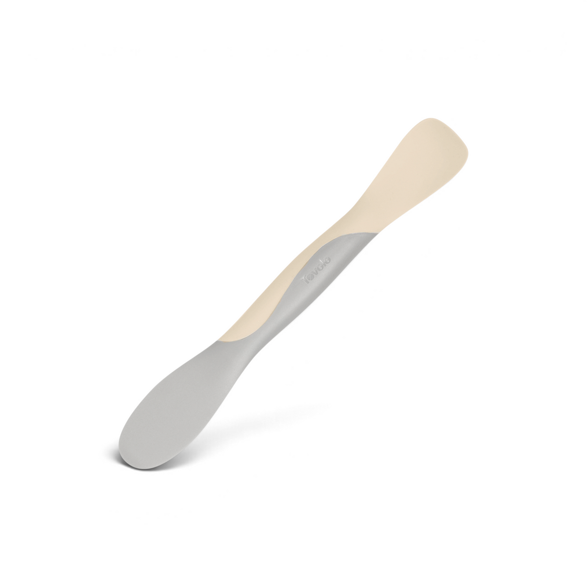 The Scoop and Spread is a versatile kitchen tool with dual ends—one flat, one rounded—for scooping and spreading. Its light grey and cream two-toned design makes it essential for every baker.
