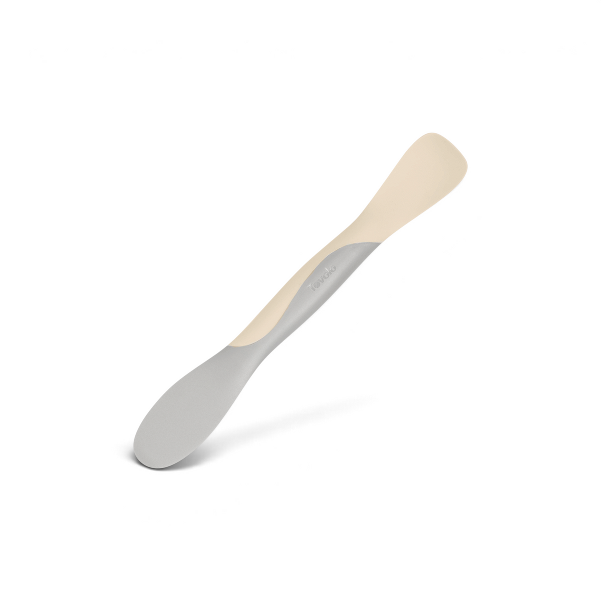 The Scoop and Spread is a versatile kitchen tool with dual ends—one flat, one rounded—for scooping and spreading. Its light grey and cream two-toned design makes it essential for every baker.