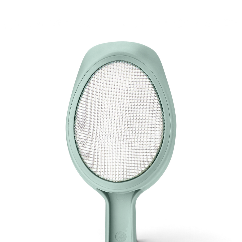 A close-up of the Scoop and Sift, a light green small sieve with fine mesh and sturdy plastic frame, ideal for sifting flour or scooping and sifting ingredients in your kitchen.