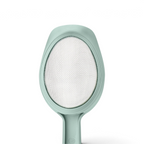 A close-up of the Scoop and Sift, a light green small sieve with fine mesh and sturdy plastic frame, ideal for sifting flour or scooping and sifting ingredients in your kitchen.