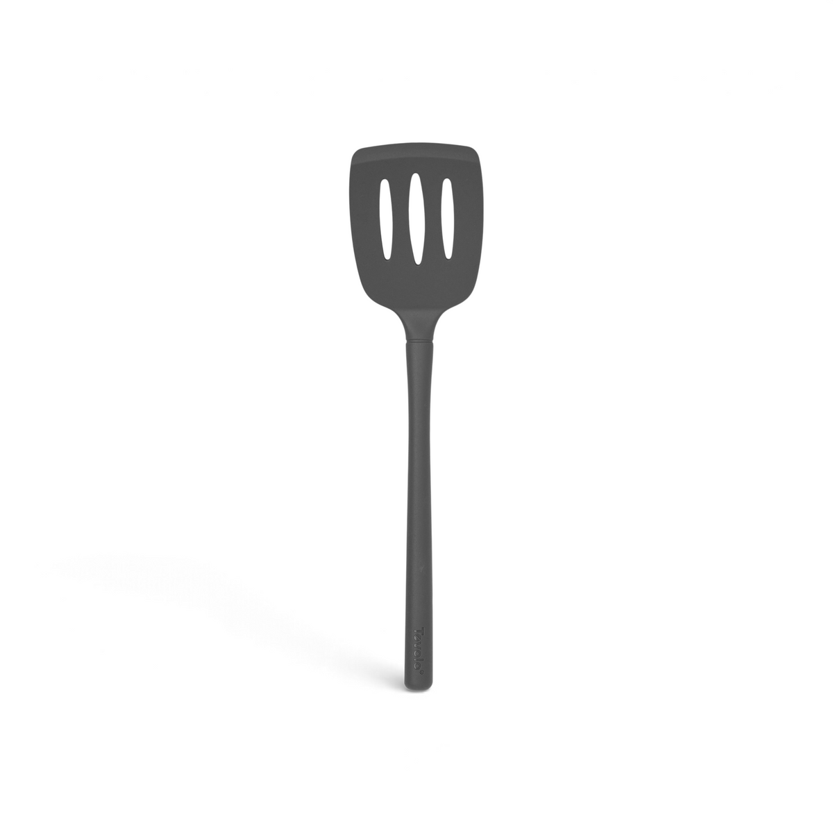 The tovolo Flex-Core Silicone Slotted Turner features a long handle and a black spatula head with three oval slots for draining liquids, making it perfect for nonstick cookware. Shown against a white background.