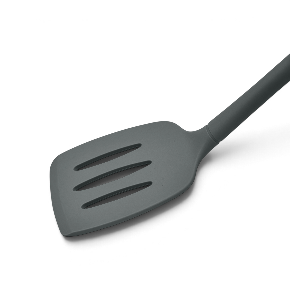 The tovolo Flex-Core Silicone Slotted Turner features a gray head with three slots for draining and a long handle. Shown on a white background, it’s ideal for nonstick cookware.