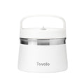 The Tovolo Insulated Food Traveler, shown in white with a handle, a stainless steel band at the top, and a secure lid, appears against a plain white background.