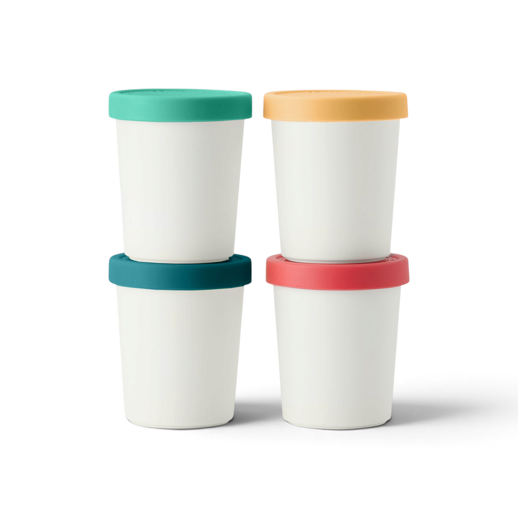 Four Mini Sweet Treats Tubs are stacked in two columns, each with a colorful silicone lid—teal, yellow, dark teal, and coral pink—set against a white background for stylish freezer burn prevention.
