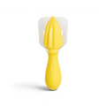 The Citrus Reamer features a yellow, pointed ridged top and ergonomic handle, attached to a white square splash guard for efficient juice extraction.