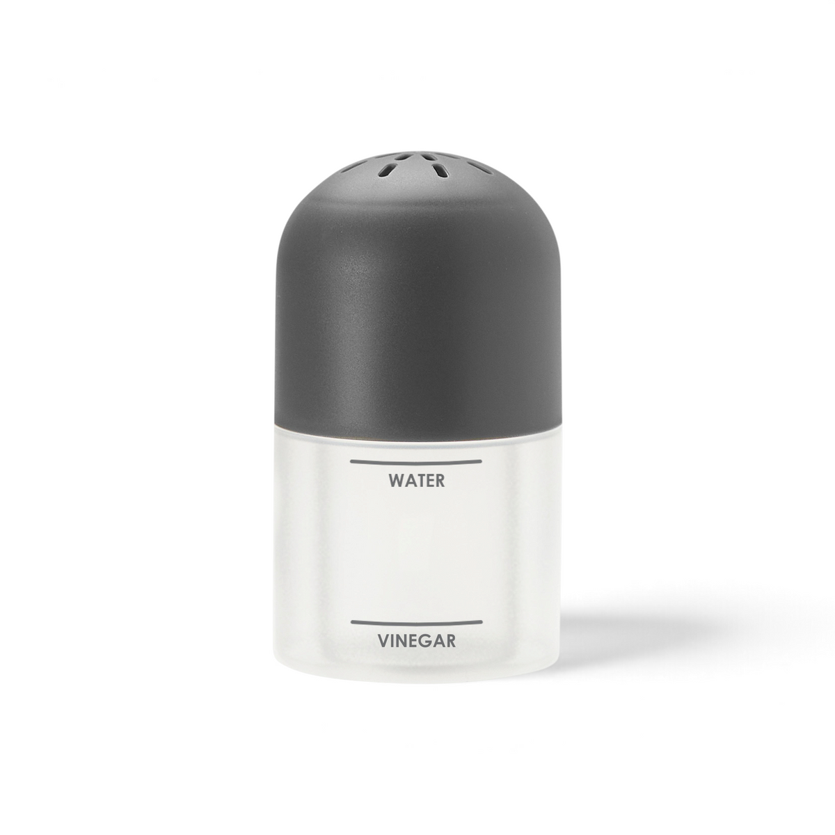 The Microwave Steam Cleaner, a clear container with a black lid labeled "WATER" on top and "VINEGAR" below, is designed for easy microwave cleaning and stands upright against a white background.