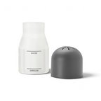The Microwave Steam Cleaner is a clear plastic container labeled water and vinegar, placed beside a black vented cap, providing effortless, chemical-free cleaning for your microwave.