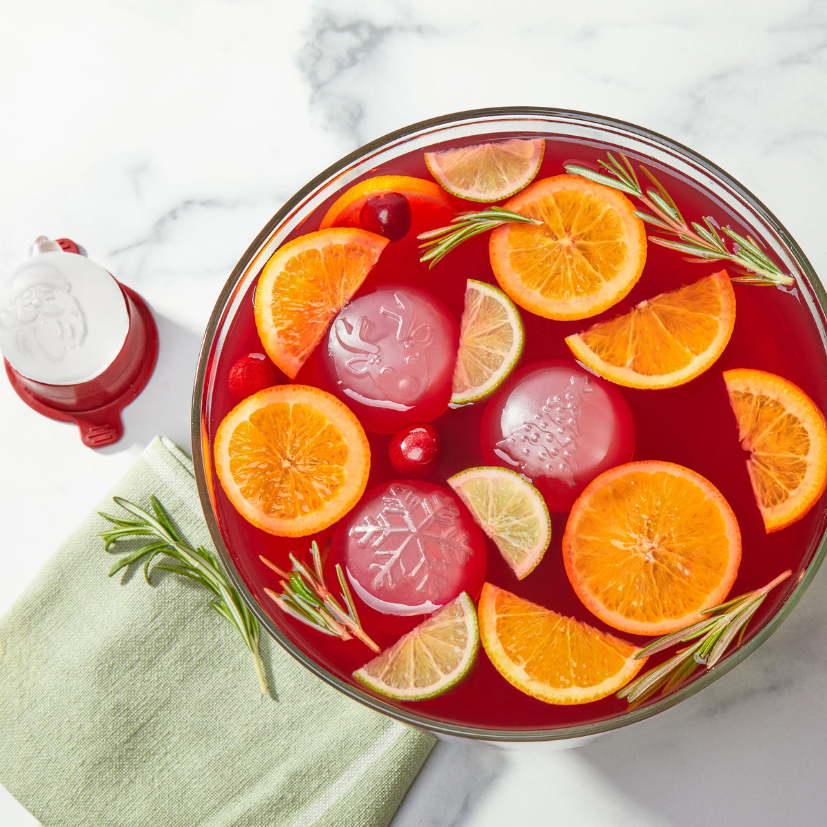 Make your holiday cocktails festive with tovolo Holiday Ice Molds—create round ice cubes for your punch bowls and drinks! Perfect for parties, these molds add cheer to any gathering.