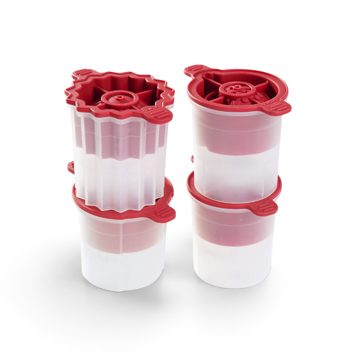 Four tovolo Holiday Ice Molds, featuring red lids and white bases, are stacked in two columns against a white background—perfect for holiday cocktails and a great Christmas gift idea.