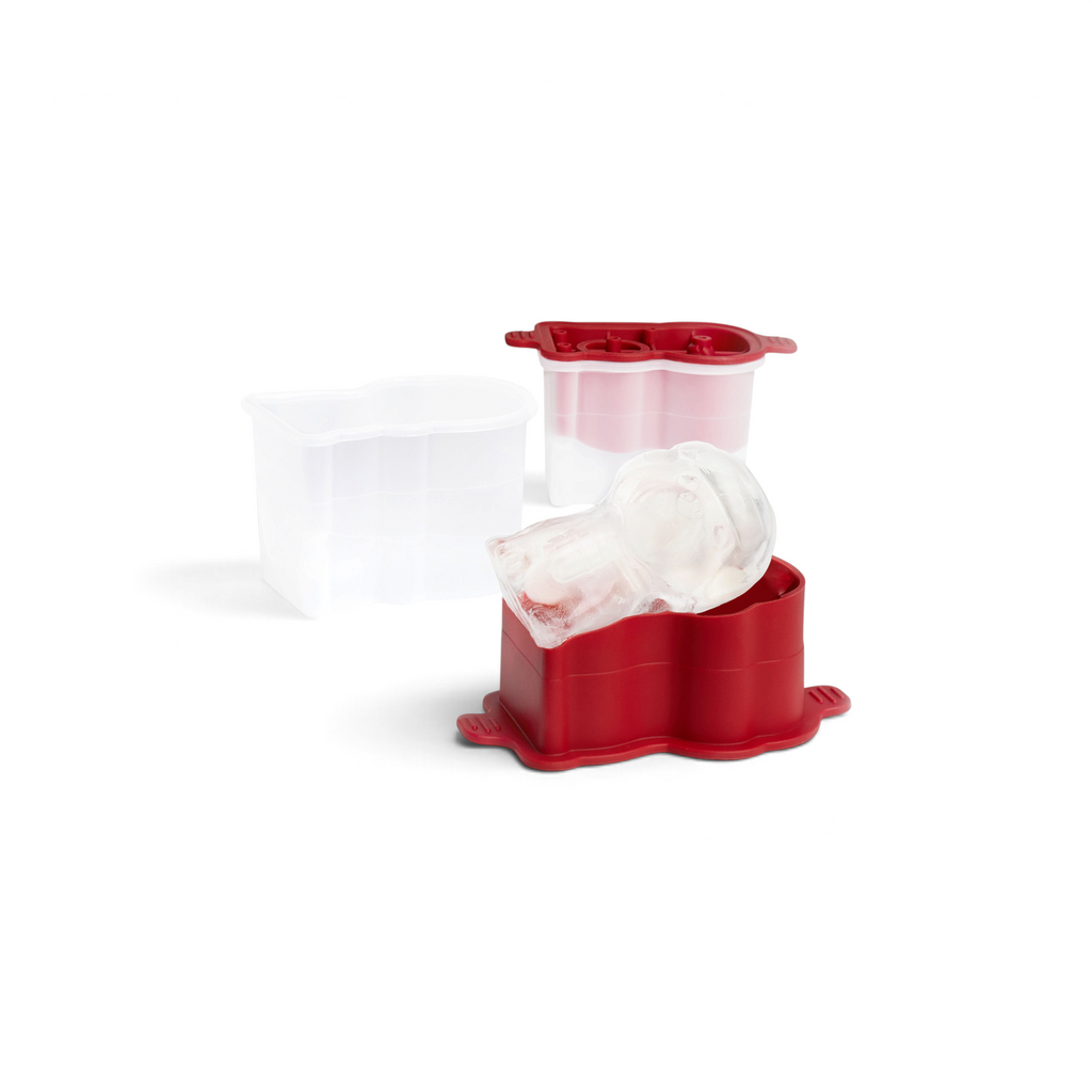 The tovolo Holiday Ice Molds feature a clear plastic skull-shaped mold with a red base, ideal for chilling festive drinks. The set includes one filled and one empty mold—perfect as a unique Christmas gift for ice mold enthusiasts.