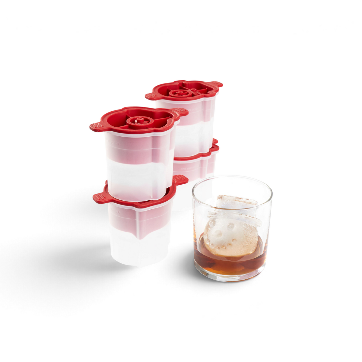 Tovolo’s Snowman Ice Molds (Set of 4) are stacked by a drink with a snowman-head-shaped cube—ideal for festive cocktails and unique Christmas gifts.