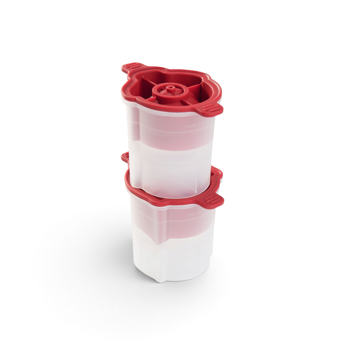Two white tovolo Holiday Ice Molds with red handled lids are stacked on a plain white background. Their cylindrical, plastic design is perfect for crafting festive cocktail ice.